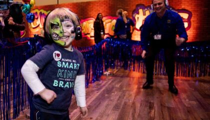 They toured the hospital, visited patients and presented a check for $20.8 million.